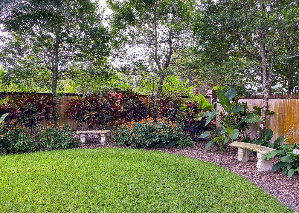 Manicured landscape with stone benches